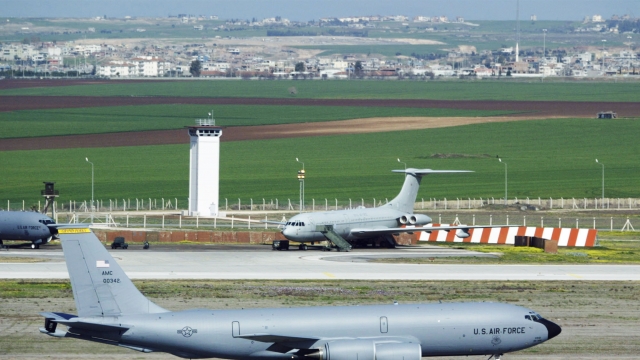 A KC-135 refueling jet slides in front of a control tower during takeoff March 7, 2003 at Incirlik Air Force Base in Turkey.