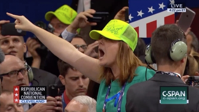 Woman protests against adopting the proposed convention rules at the Republican National Convention.
