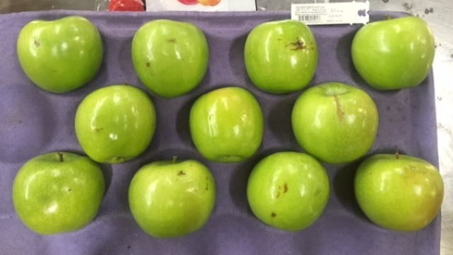 "I'm Beautiful" apples are on display.