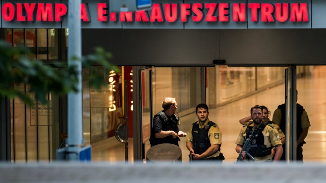 Police officers respond to a shooting at the Olympia Einkaufszentrum on July 22, 2016, in Munich, Germany.