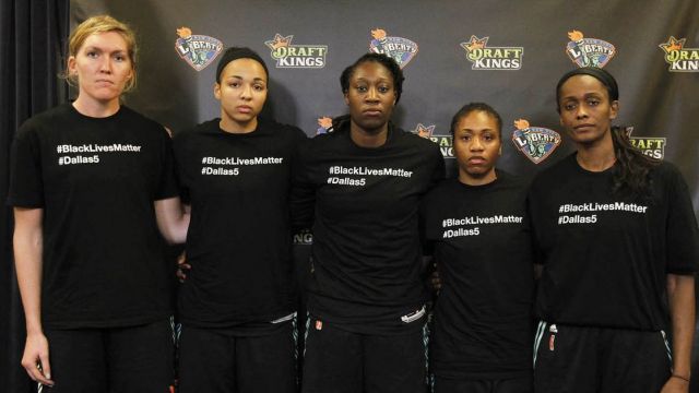 The New York Liberty wearing their version of black warmup shirts in support of BlackLivesMatter and Dallas police officers.