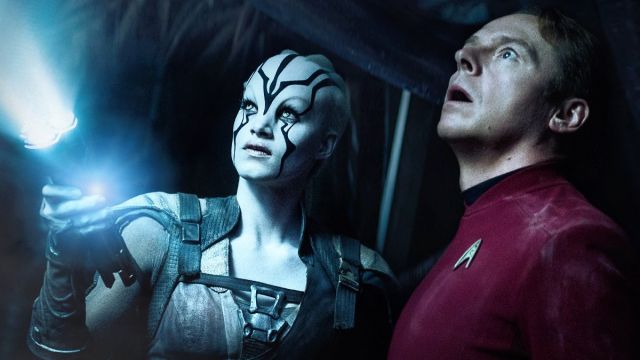 Sofia Boutella as Jaylah, a pale-skin alien with face markings, and Simon Pegg as Montgomery Scotty Scott in Star Trek Beyond