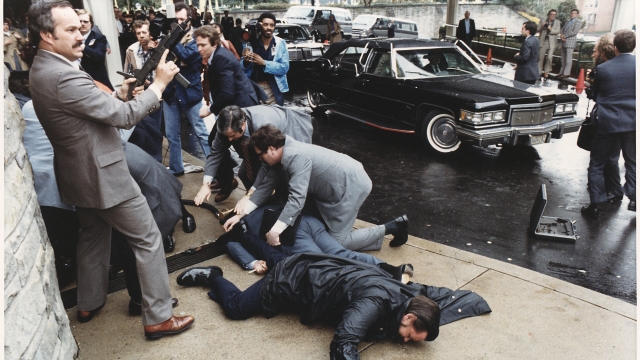 A picture of the chaos outside the Washington Hilton Hotel after the assassination attempt on President Reagan in 1981.