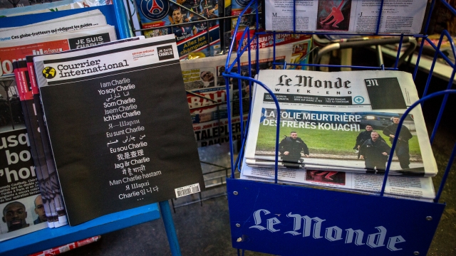 French newspapers report on the terrorist attacks on the satirical magazine Charlie Hebdo.