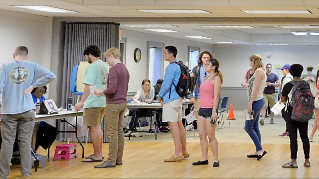 rth Carolina State University students stand in line to receive their ballots on March 15, 2016.