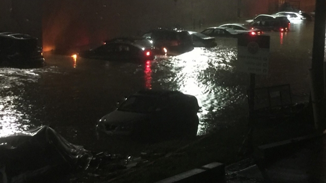 Cars are submerged in water following Ellicott City floods.