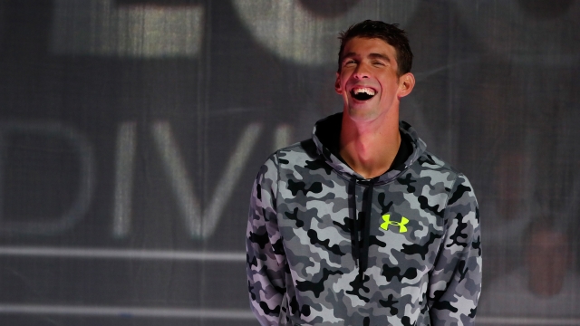 Michael Phelps of the United States participates in the medal ceremony.