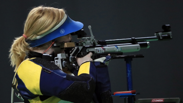 Ginny Thrasher fires and wins the 10m Air Rifle competition on the first day of the 2016 Rio Olympics.