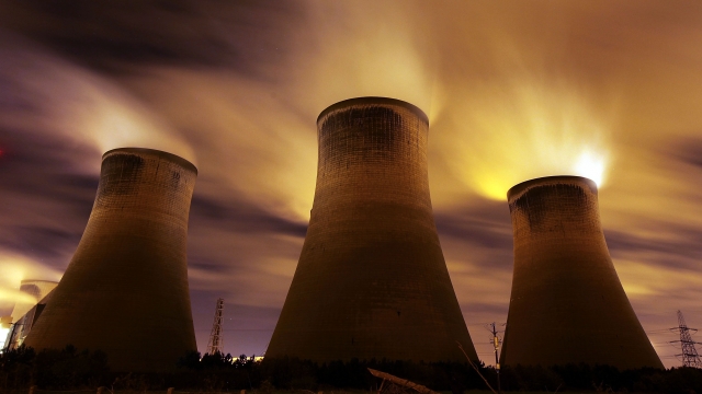 The coal fueled Fiddlers Ferry power station emits vapour into the night sky on November 16, 2009 in Warrington, United Kingd