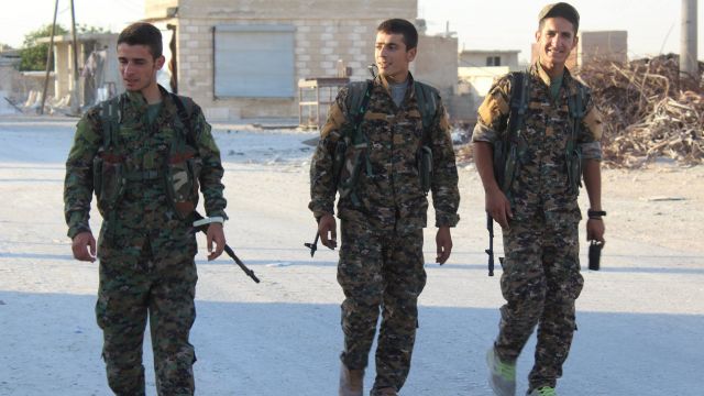 Syrian Democratic Forces in a neighborhood of Manbij