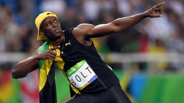 Usain Bolt of Jamaica celebrates winning the Men's 100m Final.