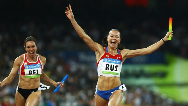 Yuliya Chermoshanskaya of Russia celebrates winning the Women's 4x100m relay final in 2008.