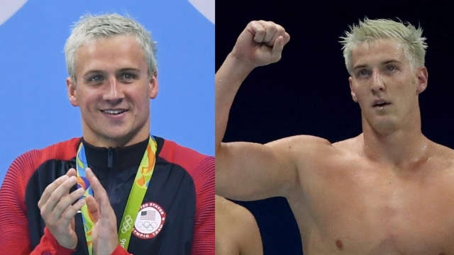 Side by side photos of Lochte with bleached hair wearing a red and blue USA suit, and Feigen bare-chested with bleached hair.