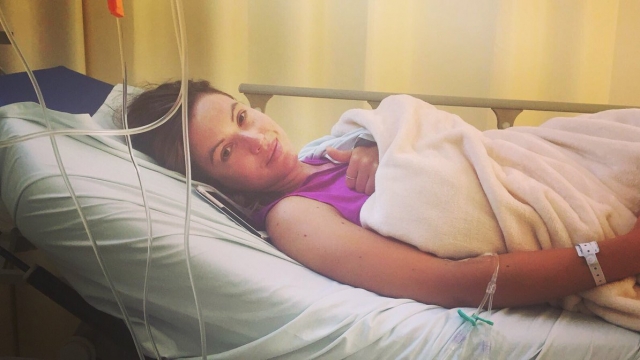 Photo of news anchor Charlie Webster in the hospital before she was placed in a medically induced coma.