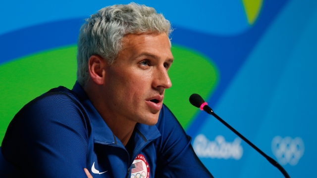 Ryan Lochte of the United States attends a press conference in the Main Press Center.