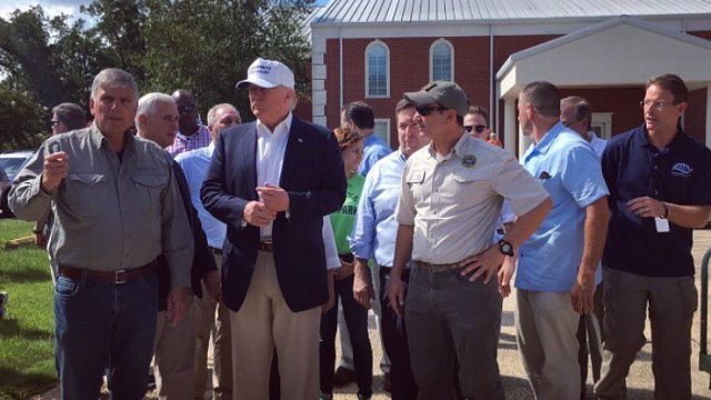 Donald Trump visits disaster-stricken Louisiana.