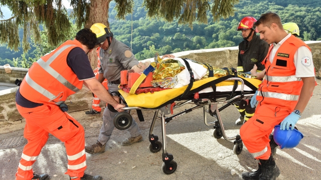 Man were rescued from the rubble after an earthquake hit central Italy.