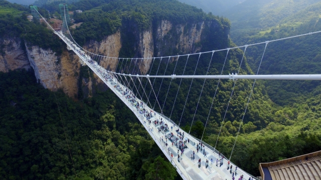 China's newest glass-bottom bridge spans nearly 1,400 feet and is 1,000 feet above the ground.