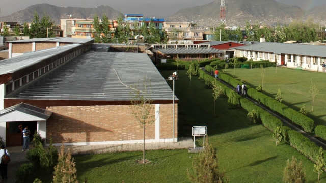 People walk on the American University of Afghanistan's campus