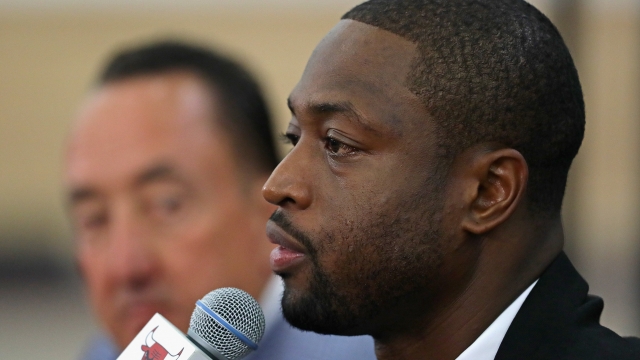 Dwyane Wade speaks at a press conference.