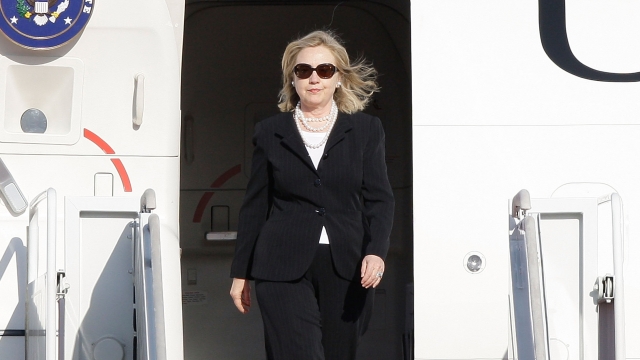 Clinton arrives at Seoul Military Airport while serving as Secretary of State.