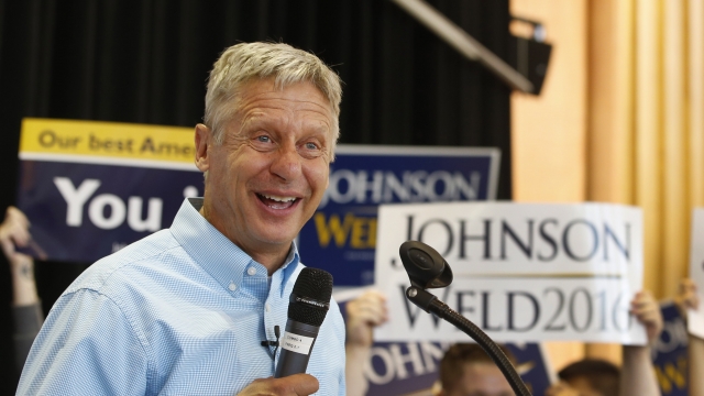 Libertarian candidate Gary Johnson talks to a crowd of supporters at a rally.