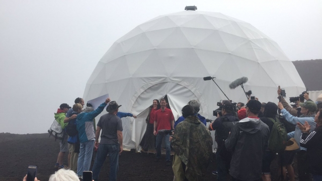 The crew of a mock mission to Mars leaves an enclosure on the Mauna Loa volcano as the mission ends.