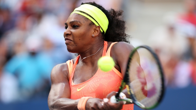 Serena Williams returns a shot to Roberta Vinci of Italy at the 2015 U.S. Open semi-finals.