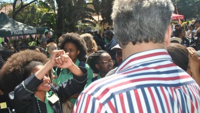 Black students in South Africa protest over a school dress code that doesn't allow Afros.