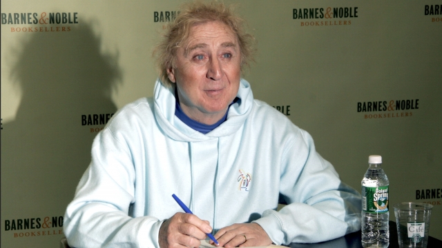Gene Wilder signs a copy of his book in 2005.