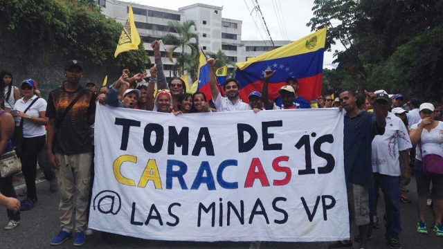 Venezuelans march in the streets of Caracas demanding a recall referendum