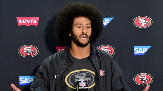 Colin Kaepernick #7 of the San Francisco 49ers speaks to media during a press conference after a game on Sept. 1.