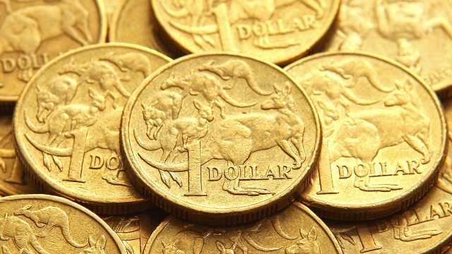Australian one dollar coins are displayed.