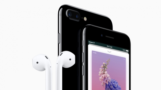 Apple's new iPhone 7, and a pair of its wireless ear buds.