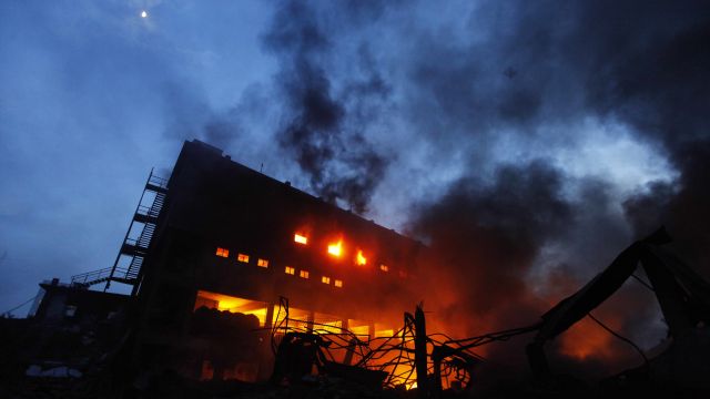 Flames rise as a fire breaks out in a factory in Bangladesh.