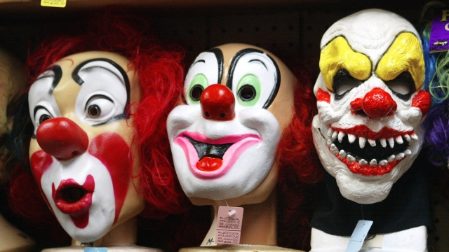 Clown masks are displayed at the Fantasy Costumes HDQ.
