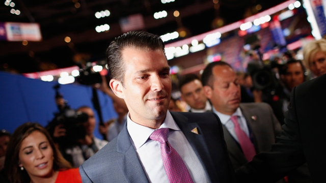 Donald Trump Jr. followed by a crowd at the Republican National Convention