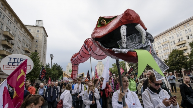 Protestors march in Berlin, Germany.