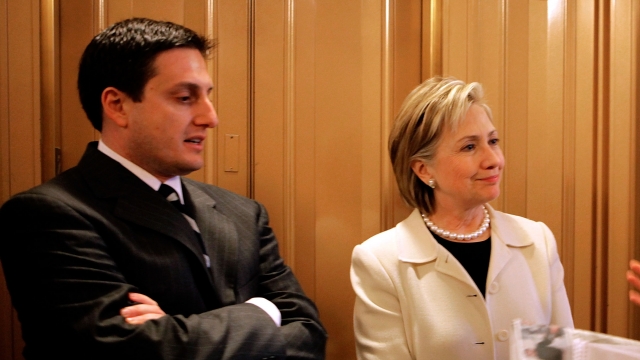 Hillary Clinton with aide Philippe Reines.
