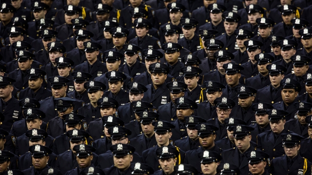 Police recruits attend the New York Police Department graduation ceremony.