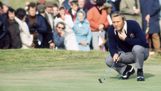 Arnold Palmer lines up a putt during the Ryder Cup in 1973.