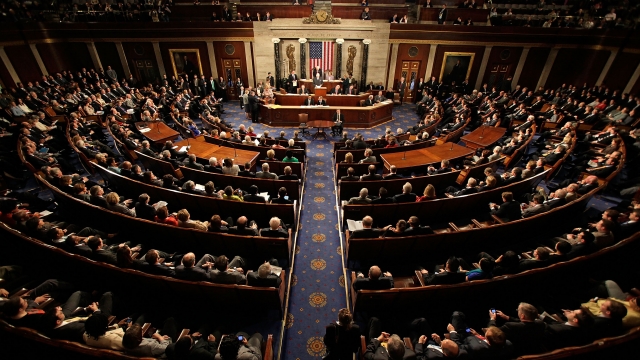 A view of the floor of the U.S. House of Representatives. Members of both the House and Senate sit in the seats.