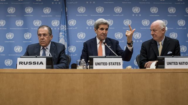 Foreign Minister of Russia Sergey Lavrov and U.S. Secretary of State John Kerry speak at a news conference.