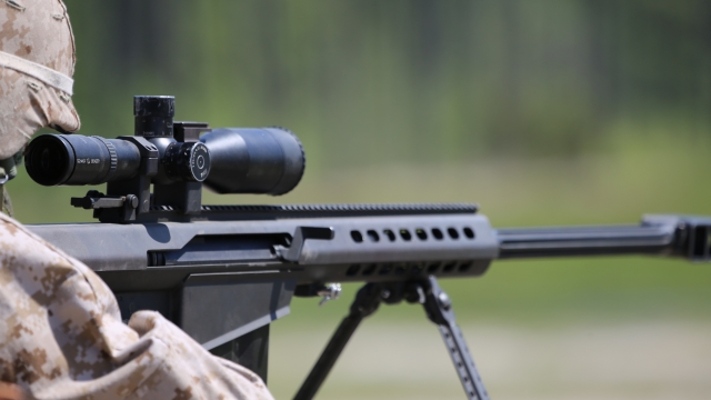 A U.S. Marine uses a sniper rifle.