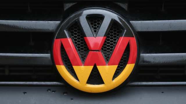 A Volkswagen logo on the front of a car.