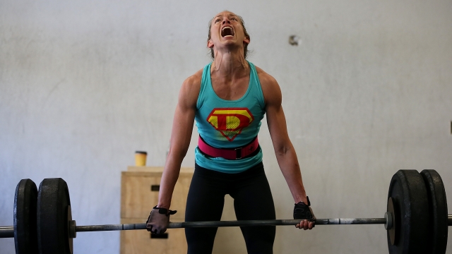Lita Collins does a deadlift during a CrossFit workout at Ross Valley CrossFit on March 14, 2014 in San Anselmo, California.