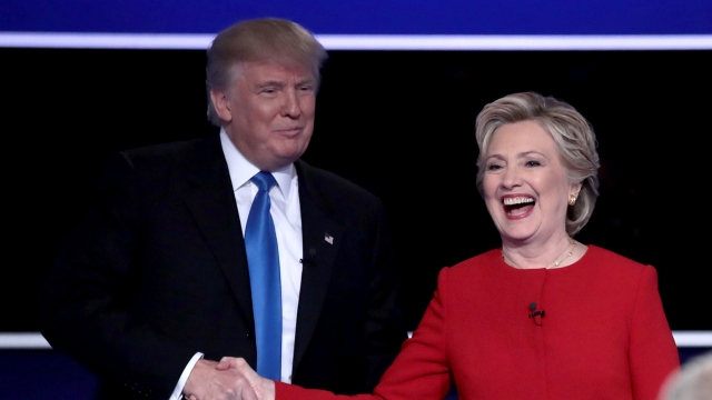 Donald Trump and Hillary Clinton shake hands after the first presidential debate.