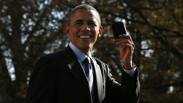 President Obama with his Blackberry.