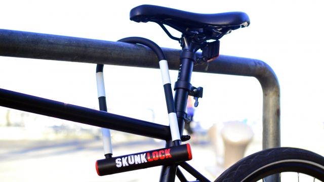 SkunkLock. secures a bike to a bike rack