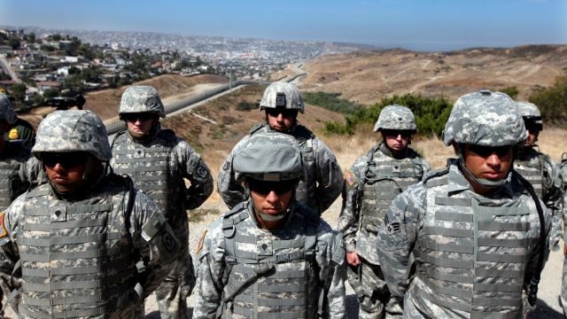 California National Guard soldiers stand in formation along the U.S.-Mexico border in 2010.